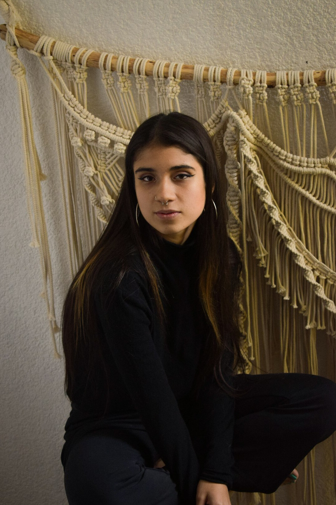 Studio portrait of a young Chilean female community coordinator